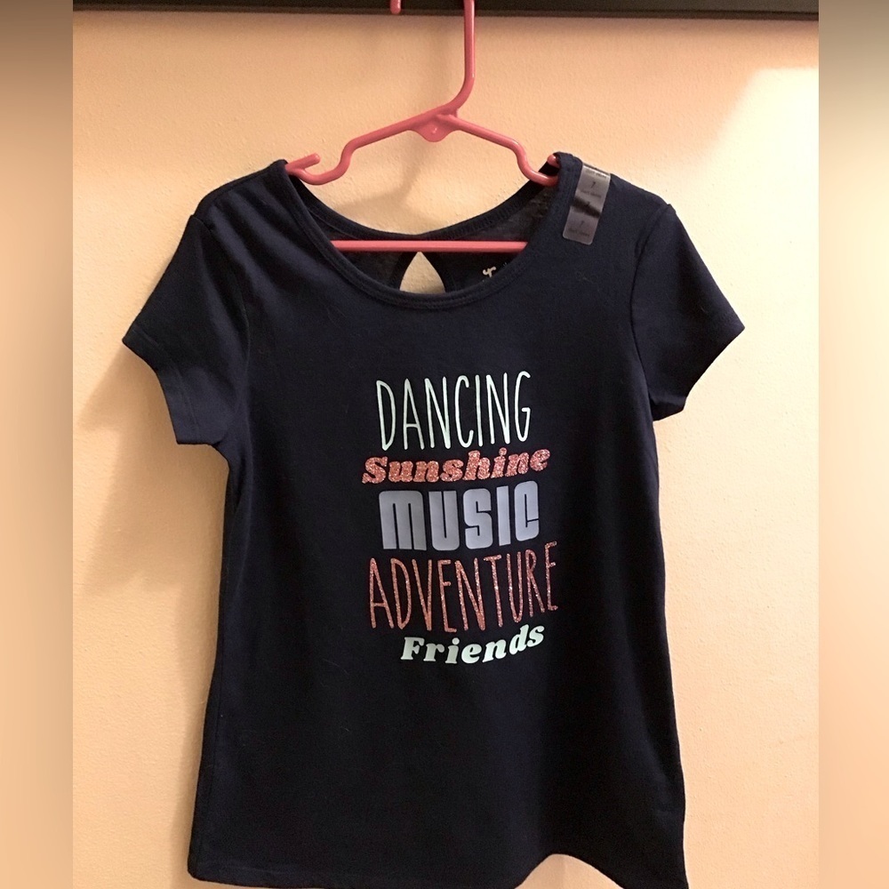Justice girl’s dark blue size 7 t-shirt. New with size tag on shoulder